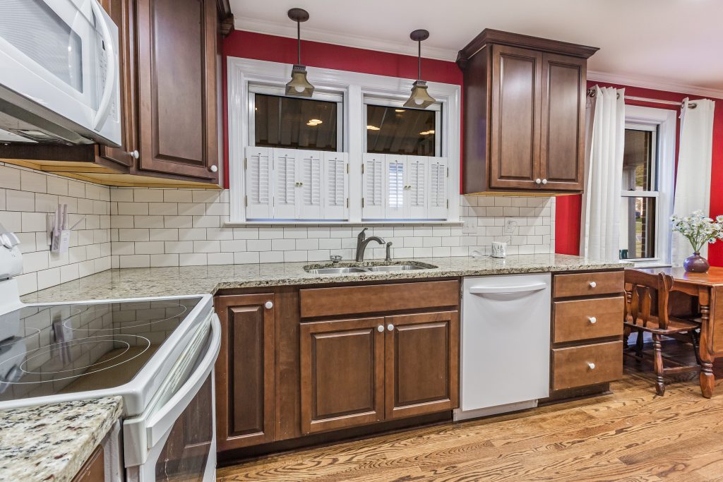 Bright kitchen and dining area photographed by Gibson Creations